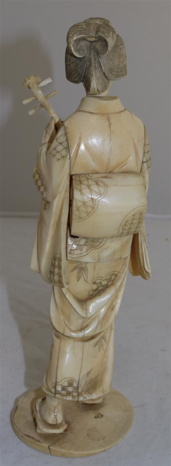 A Japanese sectional ivory figure of a bijin, early 20th century, 26.5cm